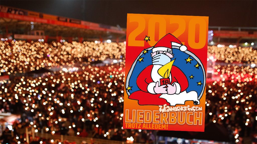 Ein Plakat mit der Aufschrift „2020 Weihnachtsliederbuch Trotz Alledem!“ vor einer Menschenmenge mit Fackeln im Hintergrund.