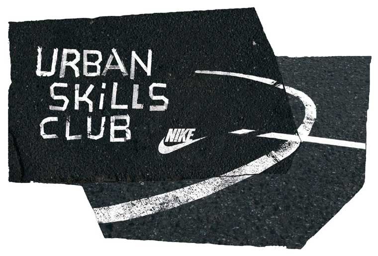 Schwarzer Asphalt mit der Aufschrift "URBAN SKILLS CLUB" und dem Nike-Logo in Weiß.