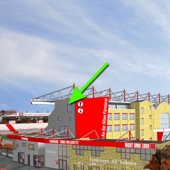 Eine Stadionansicht mit einem großen roten Schild, das den Namen "Ander Alten Försterei" zeigt.