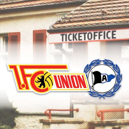 Logo des 1. FC Union Berlin und des FC Arminia Bielefeld vor einem Ticketbüro.
