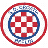 Logo von S.D. Croatia Berlin mit rot-weißen Schachbrettmustern und einem blauen Rand.