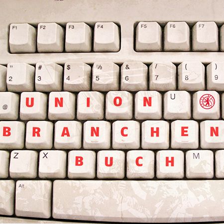 Tastatur mit sichtbaren Tasten, auf denen in roter Schrift "UNION BRANCHEN BUCH" steht.