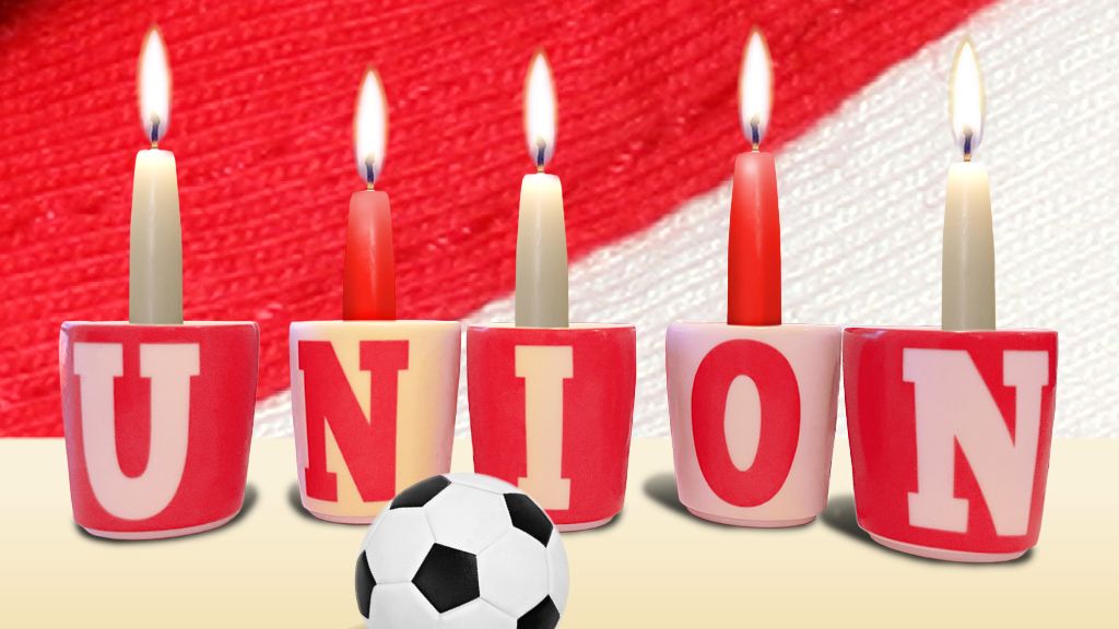 Five candles with red holders forming the word "UNION" stand in front of a soccer ball on a colored background.