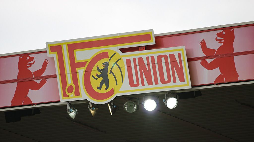 Logo des 1. FC Union Berlin mit stilisierten Bären und Scheinwerfern.