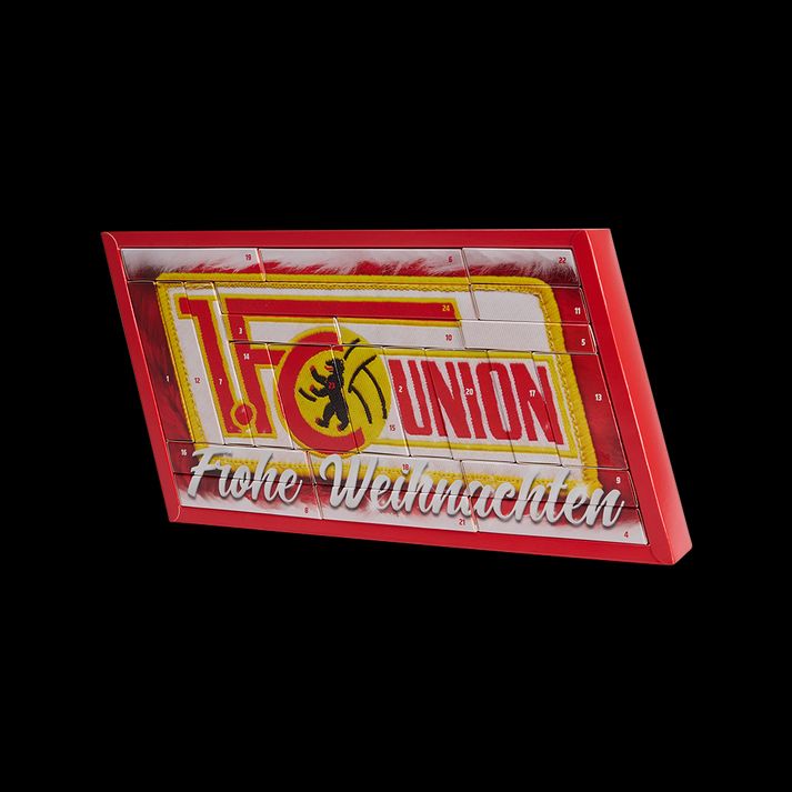 Logo von Union mit der Aufschrift „Frohe Weihnachten“ auf einem roten Hintergrund.